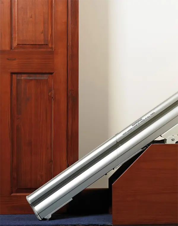 What is a stairlift power hinge down